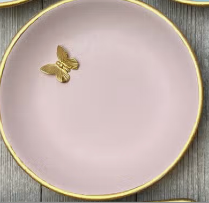 Pink accent dish with gold bee
