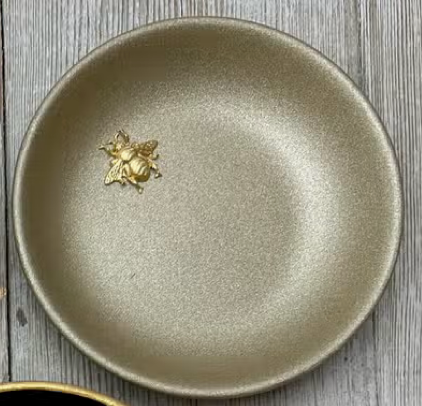 Gold accent dish with gold butterfly